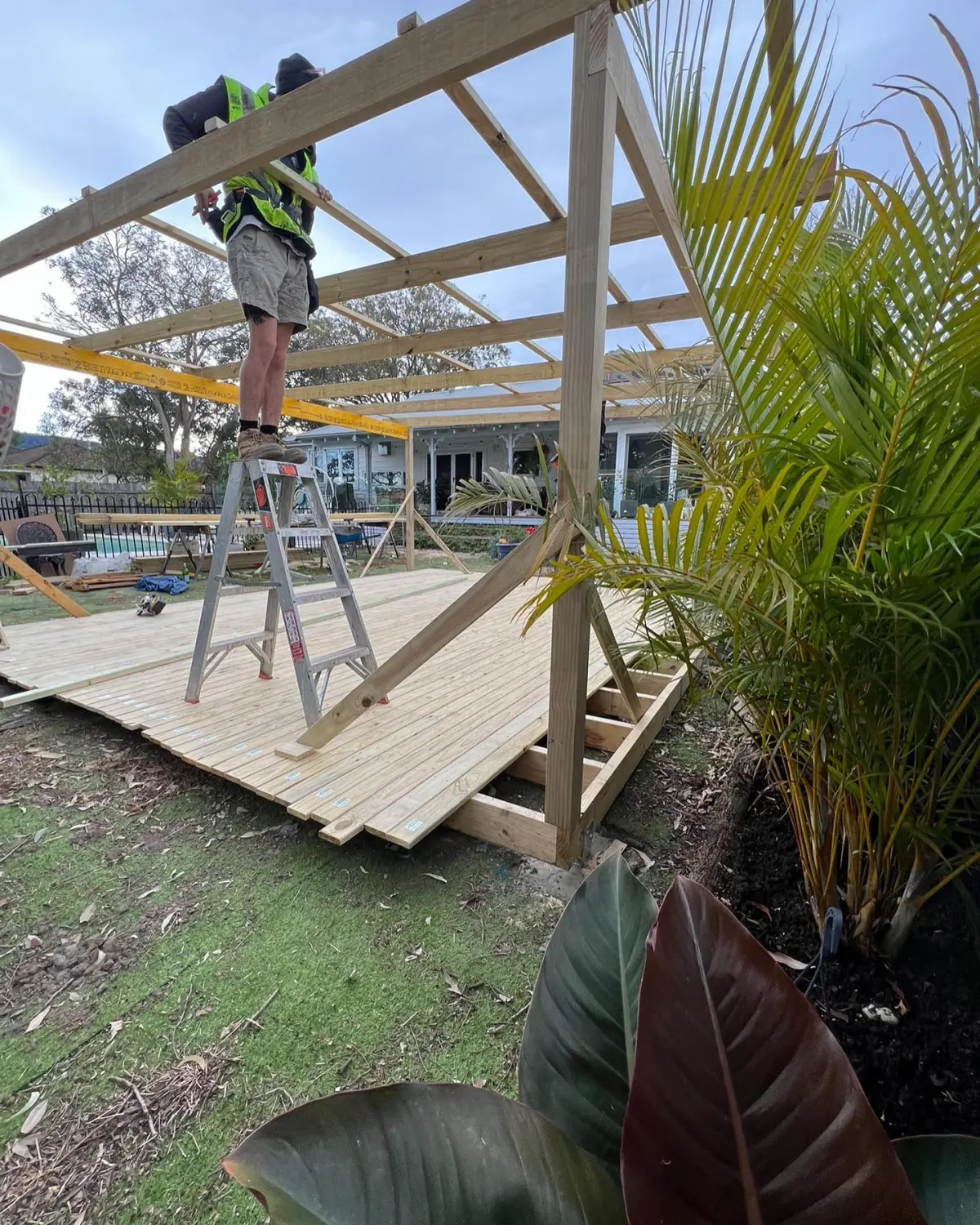 All Round Carpentry framing a new pergola over a deck in the Illawarra